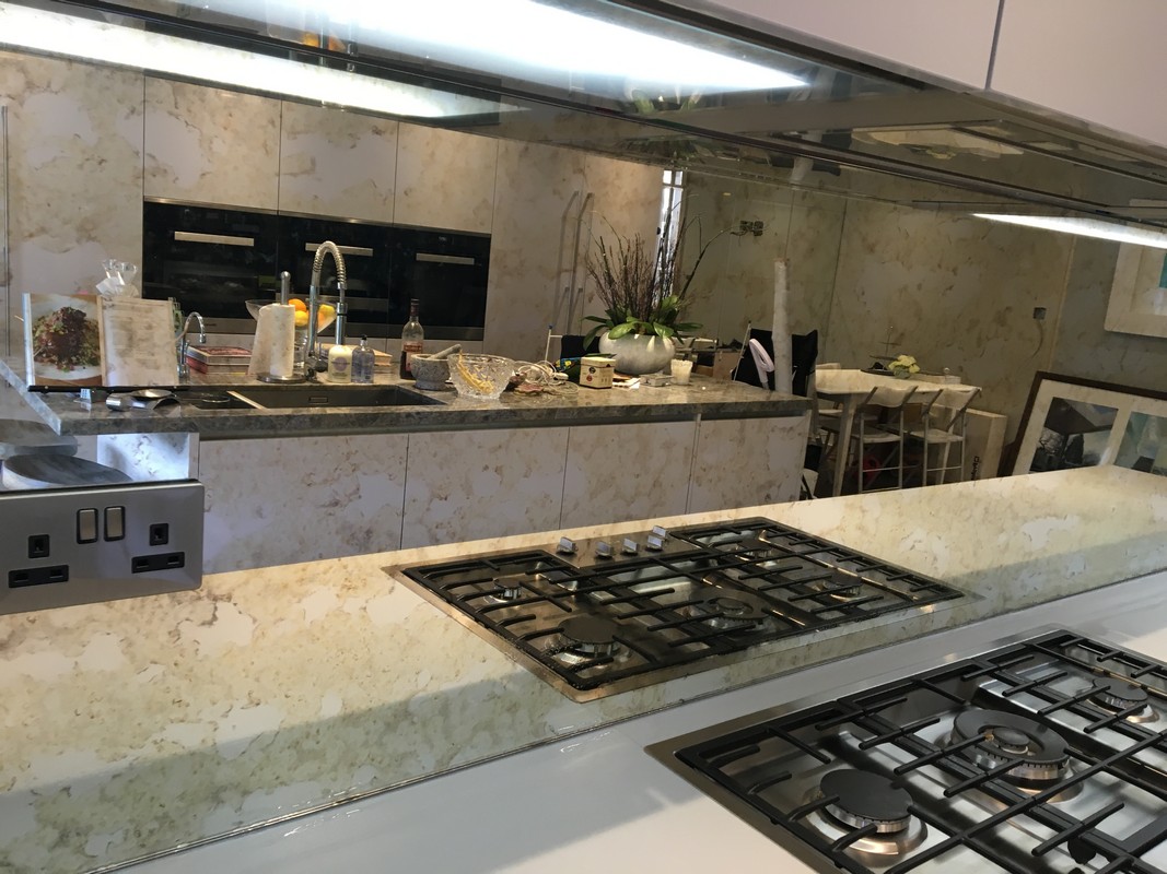 Mirror glass splashback in Twickenham luxury kitchen